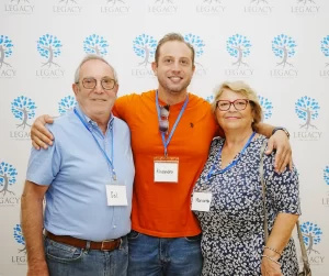 A family together in front of a legacy healing backdrop, creating a warm and inviting atmosphere. The scene captures a moment of connection and tranquility, contrasting with the chaos often associated with substance use and the adverse effects of when you party with drugs.