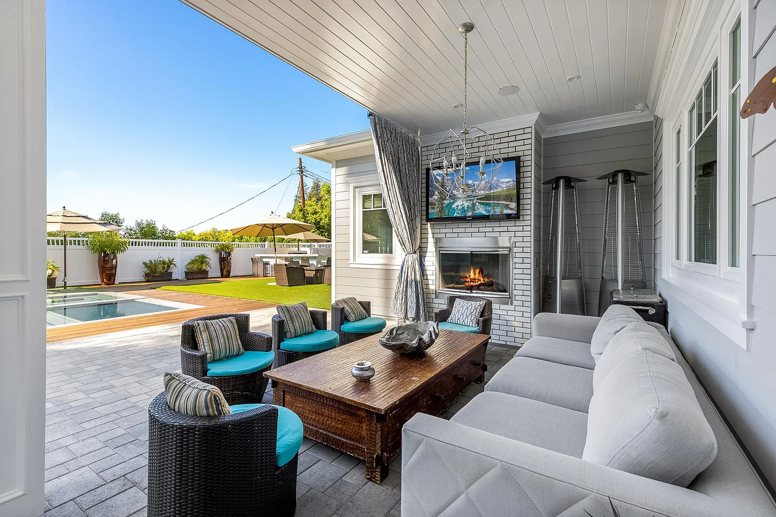 The image depicts a tranquil outdoor wellness space featuring comfortable seating surrounded by lush greenery, ideal for group therapy sessions or individual reflection during the recovery journey from addiction. This serene environment supports mental health and offers a peaceful setting for personalized treatment plans in outpatient treatment programs.